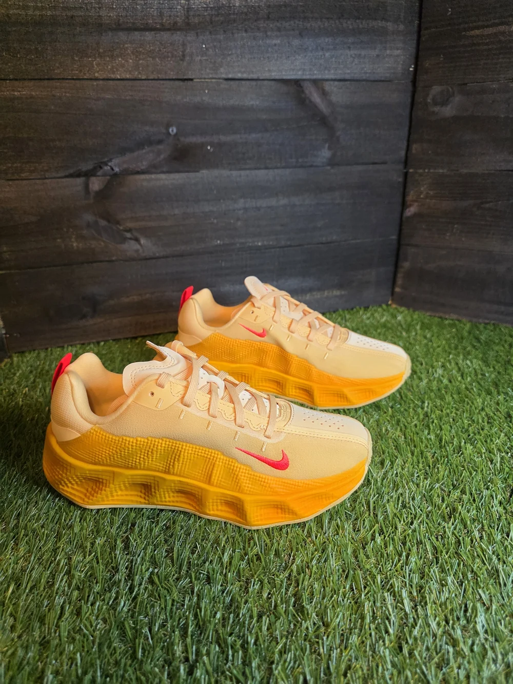 Nike Peach and Yellow Low-Top Sneakers with Pink Swoosh